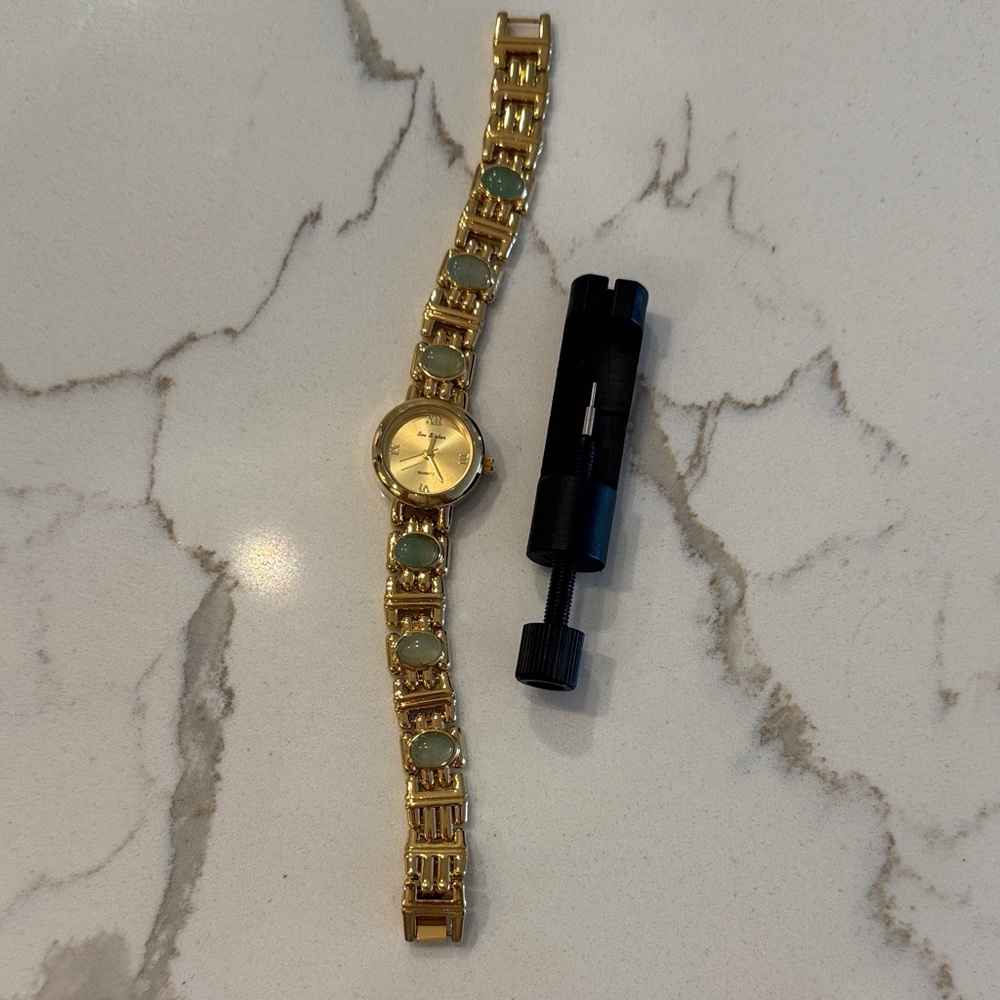 Gold and green watch